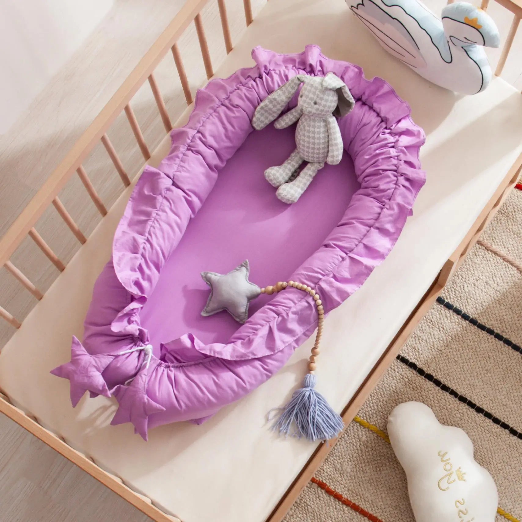 Nid de bébé portable pour les siestes, offrant un espace de repos sécurisé